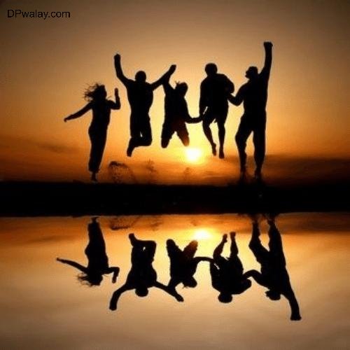a group of people jumping in the air school friends group dp 