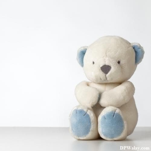 a teddy bear sitting on a table whatsapp dp cute teddy bear images