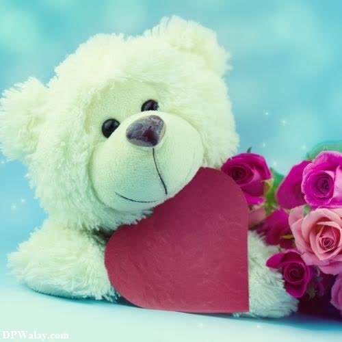 teddy bear with a heart and flowers images by DPwalay
