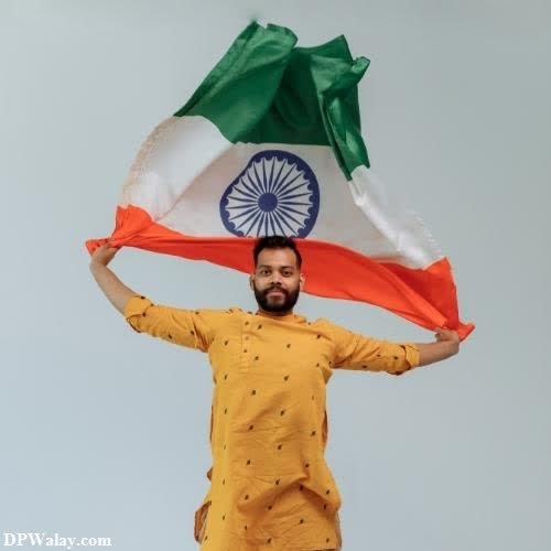 a man holding an indian flag in his hands whatsapp indian flag for whatsapp dp
