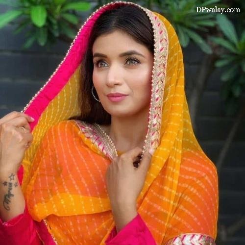 a woman in a colorful sari