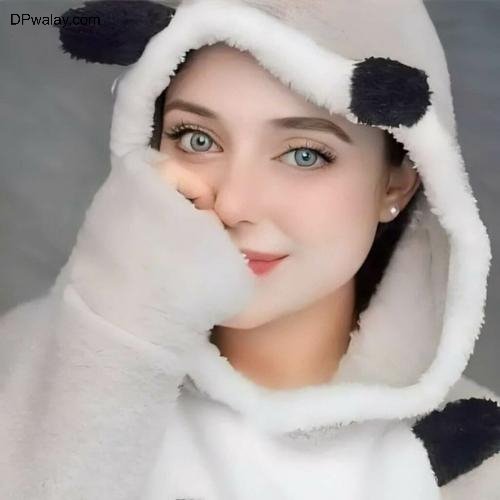 a woman wearing a panda costume