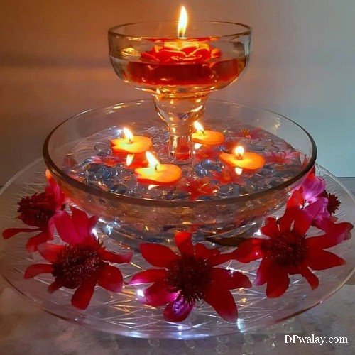 a glass bowl with candles and flowers on it aesthetic pictures for dp 