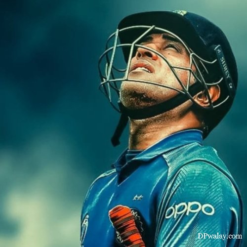 man in blue shirt and helmet cricket dp