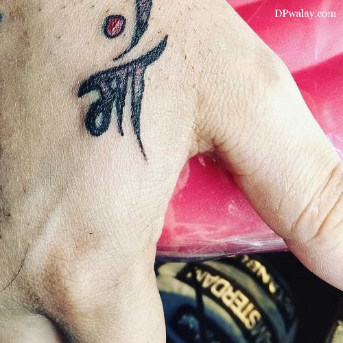 person with tattoo on their hand