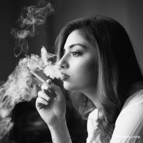 woman smoking cigarette in her bedroom sad smoking dp