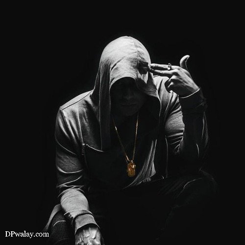 man in hoodie crouching on black background stylish boy dp