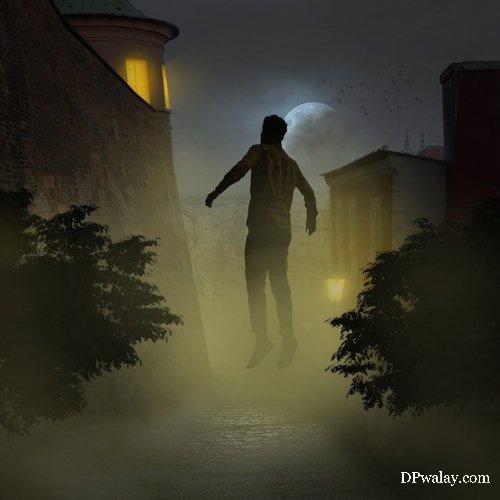 man walking down street in the fog
