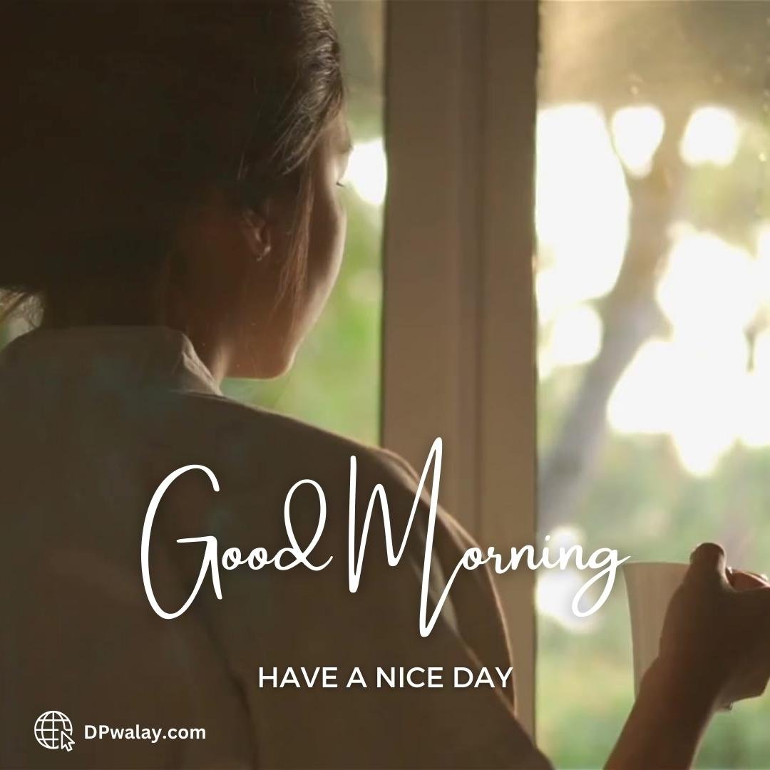 woman looking out window with the words god morning have nice day Beautiful Good Morning